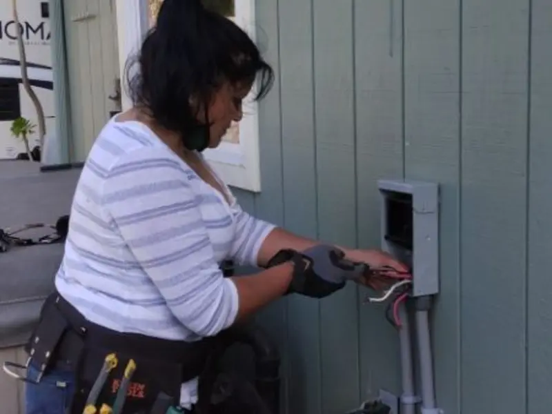 Licensed electrician wiring an exterior subpanel in Wood-Ridge