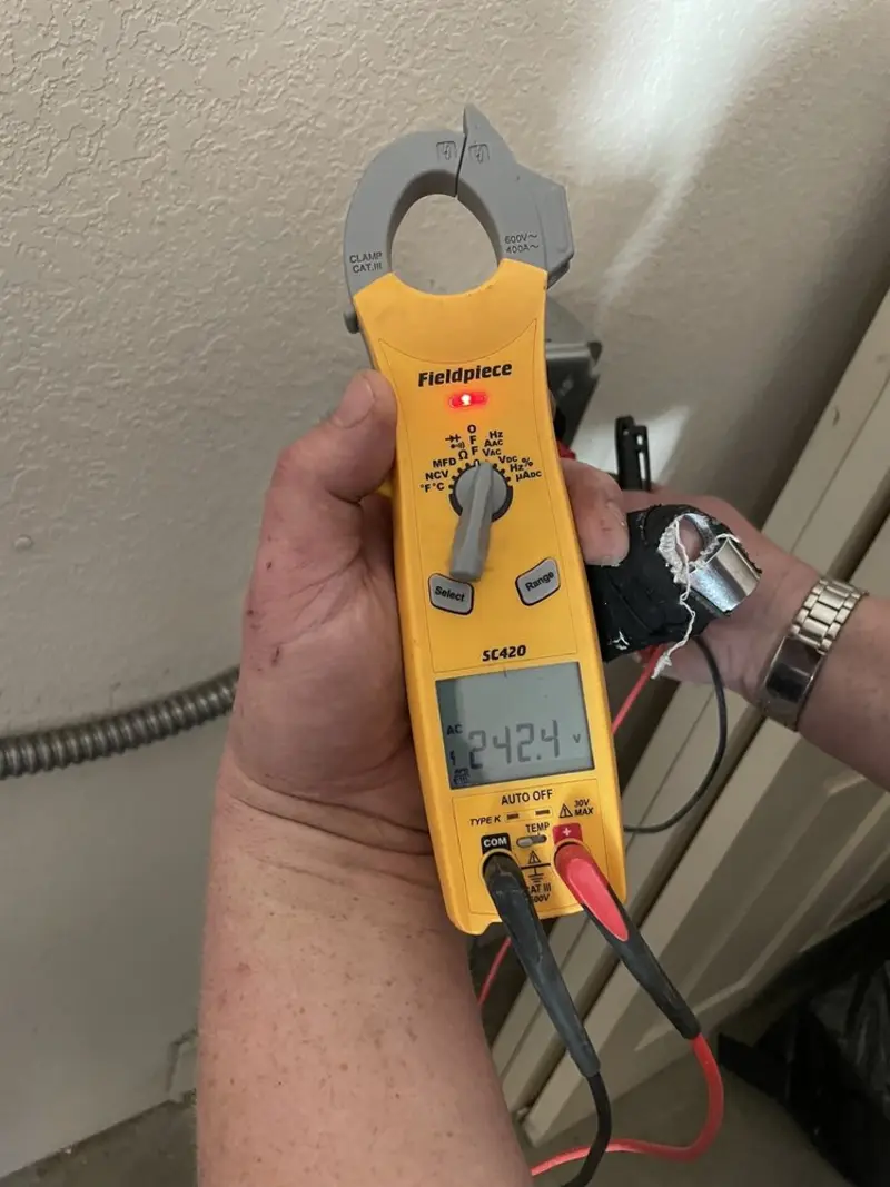 Voltage testing with clamp meter during Circuit Breaker Repair in Wood-Ridge